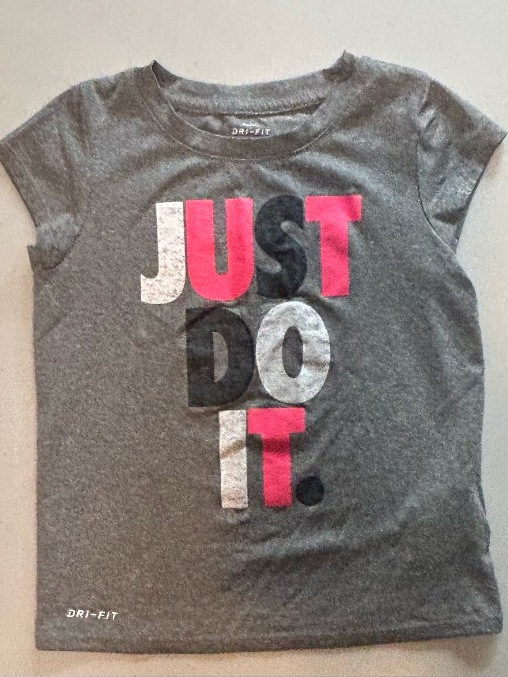 Nike Kids Gray Graphic Tee with Pink & Black 'JUST DO IT' Letters